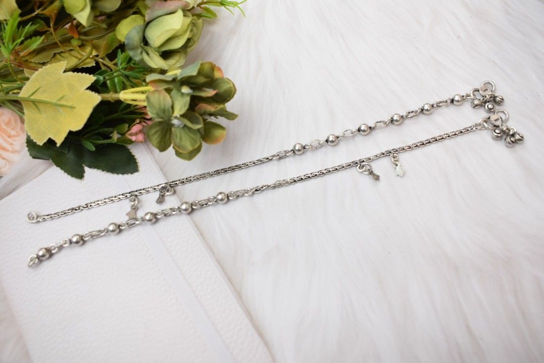 Impressive Chain and Charms Silver Anklets - Shop premium silver designer anklets in affordable price, stylish anklets for women.
