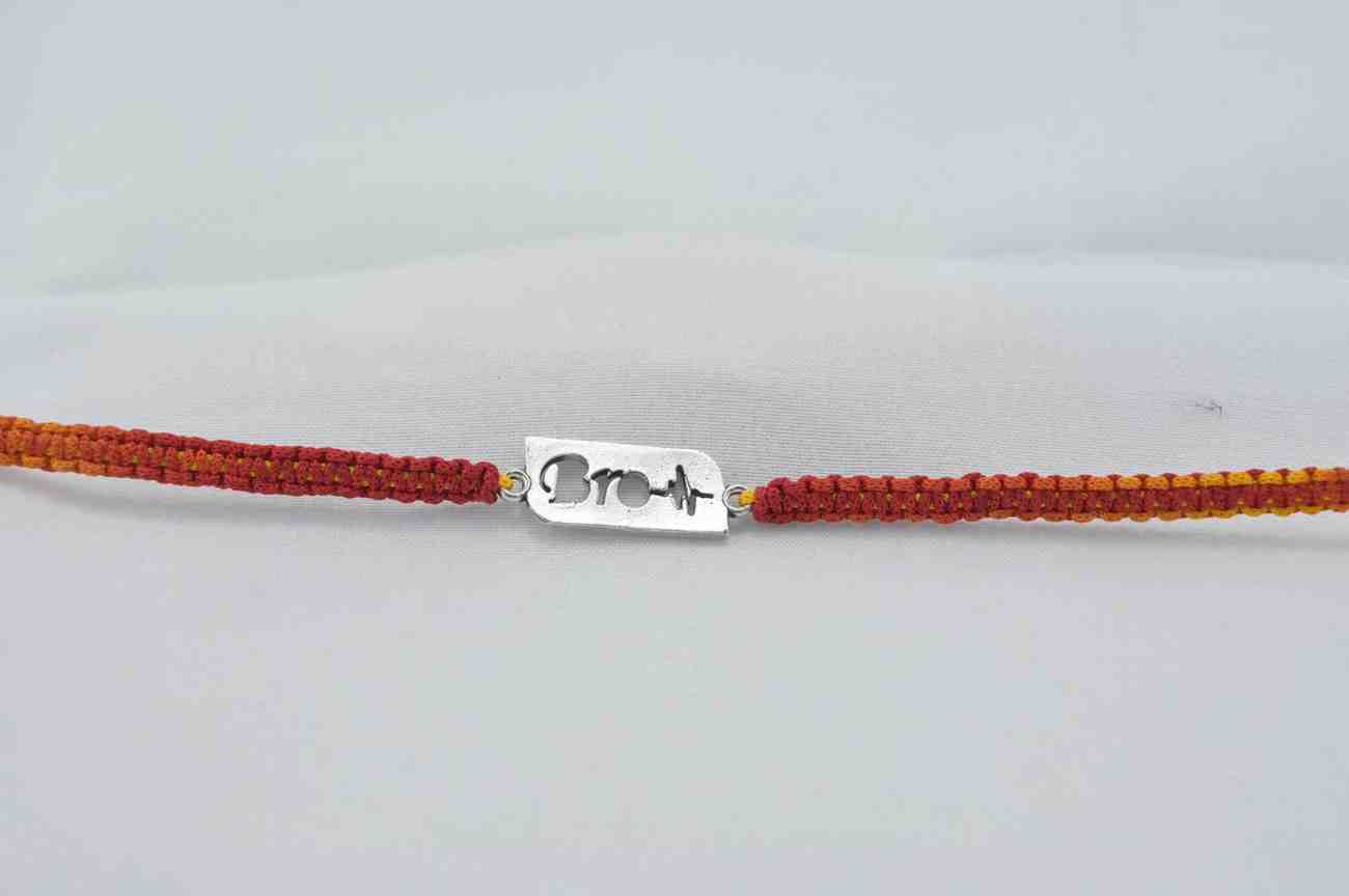 Bro with heartbeat design silver rakhi made from 925 sterling silver, perfect for Raksha Bandhan.