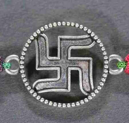 Divine round Swastik design silver rakhi made from 925 sterling silver, perfect for Raksha Bandhan.