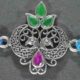 Intricate dual peacock fusion cutstone silver rakhi made from 925 sterling silver, perfect for Raksha Bandhan.