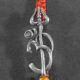 Divine Om and Trisul design silver rakhi made from 925 sterling silver, perfect for Raksha Bandhan.