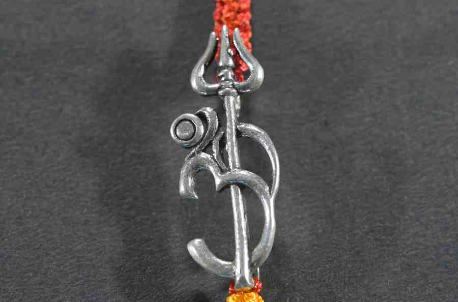 Divine Om and Trisul design silver rakhi made from 925 sterling silver, perfect for Raksha Bandhan.